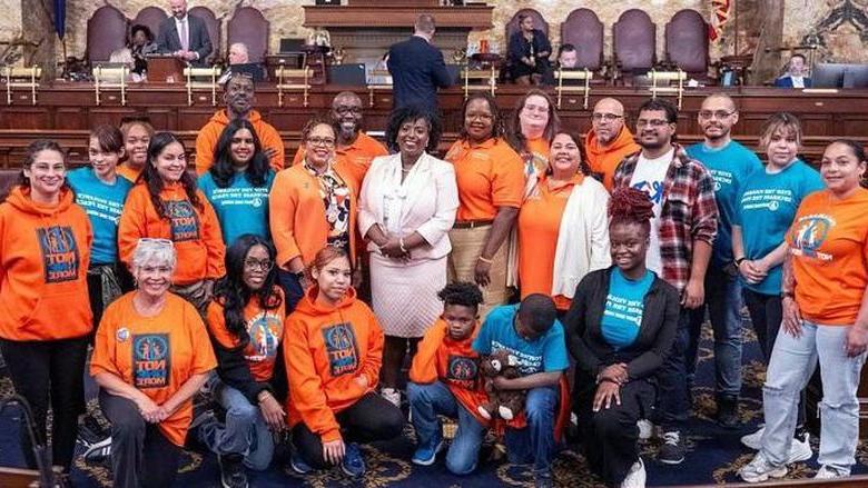 Group of students wearing "Not One More" gear in Harrisburg.